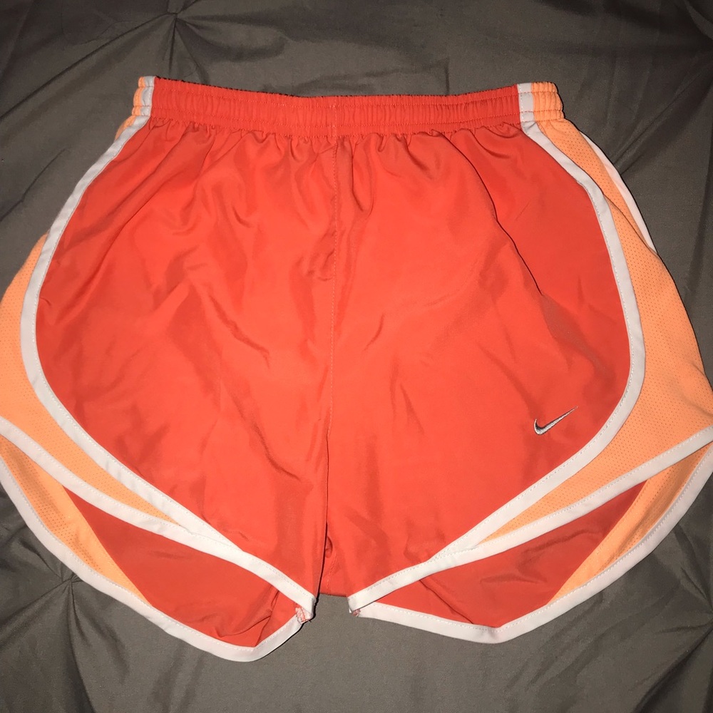 Orange Nike shorts